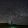 Stars are seen over Dunstanburgh Castle in the early hours of the morning, between the villages of Craster and Embleton, in Northumberland, England, April 11, 2019. 