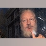 Julian Assange arrives at Westminster Magistrates' Court after the WikiLeaks founder was arrested in London, April 11, 2019. 