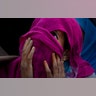 A Kashmiri Muslim woman with her face covered prays on the occasion of Mehraj-u-Alam, believed to mark the ascension of Prophet Muhammad to heaven, in Srinagar India, April 4, 2019. 