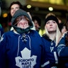 Fans react as they watch the Toronto Maple Leafs be eliminated from the Stanley Cup hockey playoffs by the Boston Bruins in Toronto, April 23, 2019. 