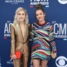 Maddie Marlow, in a gold pant suit, and Tae Dye, in a sequined mini, stun at the award show.