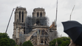 Cranes work at Notre Dame cathedral, in Paris, Thursday, April 25, 2019. French police scientists were starting to examine Notre Dame Cathedral on Thursday for the first time since last week's devastating fire.