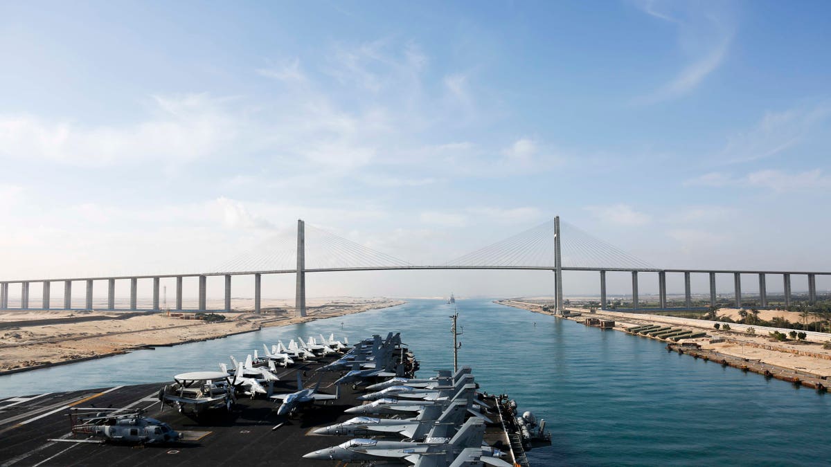 The Nimitz-class aircraft carrier USS Abraham Lincoln (CVN 72) transiting the Suez Canal.