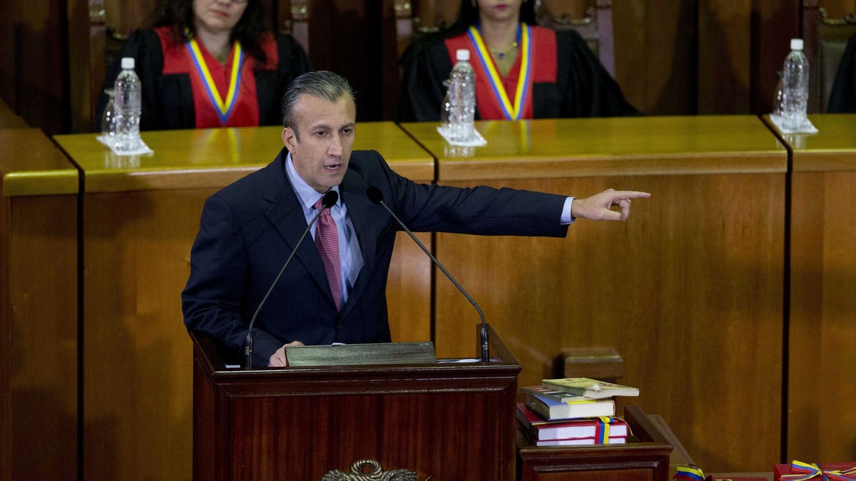 FILE - In this March 3, 2017 file photo, Venezuela's Vice President Tareck El Aissami, center, delivers his state of the nation report at the Supreme Court in Caracas, Venezuela. Charges were unsealed Friday, March 8, 2019 against the former Venezuelan vice president in New York federal court as authorities accused him of using his office to aid international drug traffickers.