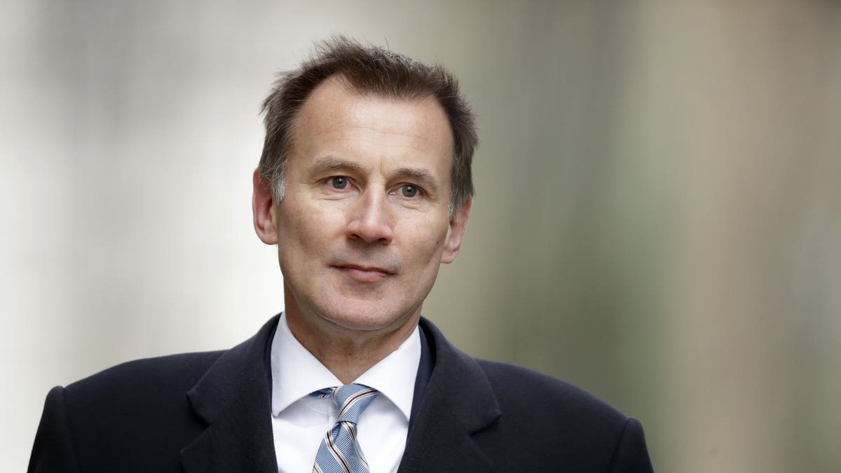 FILE - In this Wednesday, March 13, 2019 file photo, Britain's Foreign Secretary Jeremy Hunt arrives for a cabinet meeting at 10 Downing Street in London. Prime Minister Theresa May’s announcement that she will leave 10 Downing Street has set off a fierce competition to succeed her as Conservative Party leader _ and as the next prime minister.