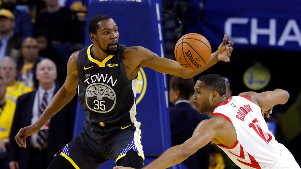 Kevin Durant (35), seen here with the Golden State Warriors last April, reportedly plans to sign with the Brooklyn Nets. (AP Photo/Jeff Chiu, File)