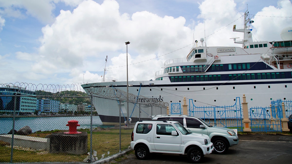 Health officials said they will board the ship (pictured) when it arrives early Saturday and assess who has been vaccinated or had the disease previously.