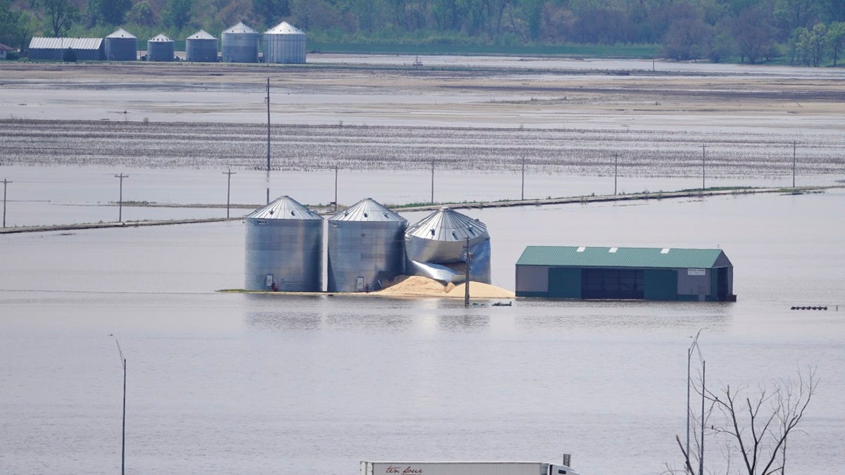 Grain bins stand in floodwaters from the Missouri River, in Hamburg, Iowa, on May 10. (AP Photo/Nati Harnik, File)