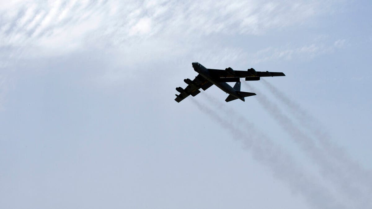 In this Sunday, May 12, 2019 photo released by the U.S. Air Force, a U.S. Air Force B-52H Stratofortress aircraft assigned to the 20th Expeditionary Bomb Squadron takes off from Al Udeid Air Base, Qatar.