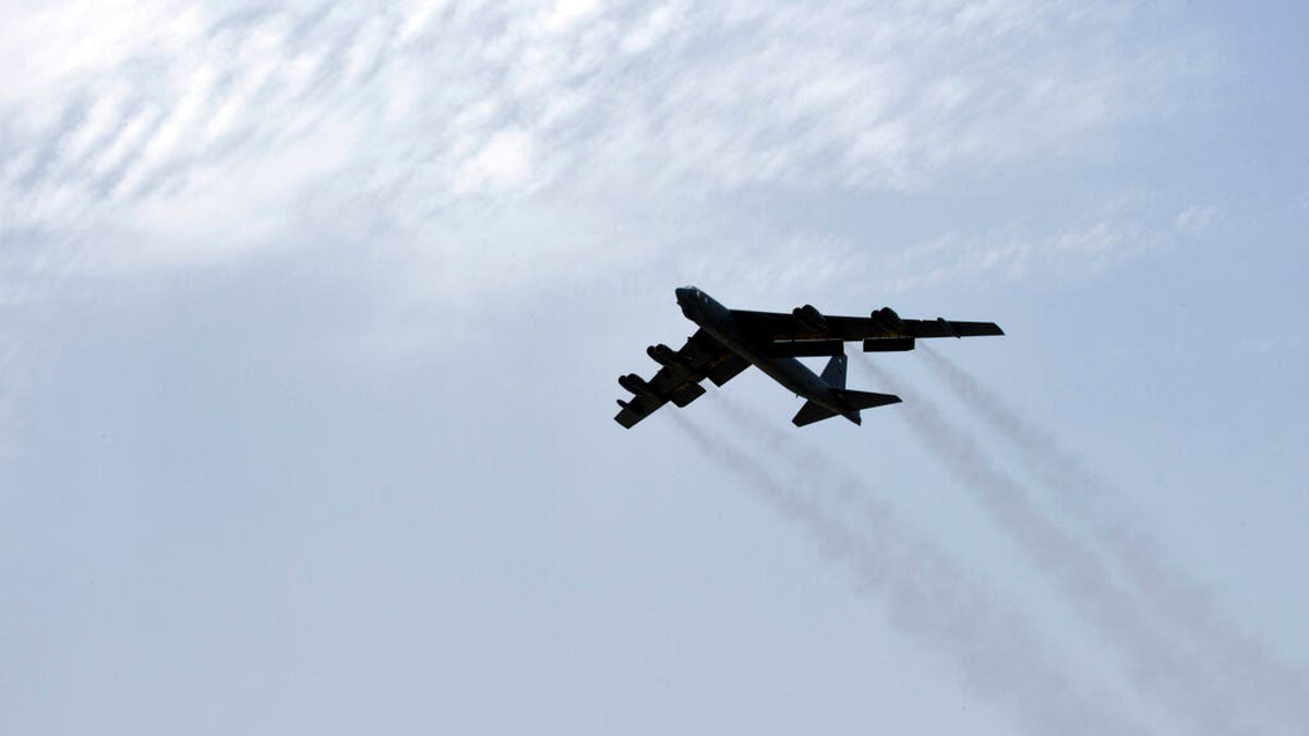In this Sunday, May 12, 2019 photo released by the U.S. Air Force, a U.S. Air Force B-52H Stratofortress aircraft assigned to the 20th Expeditionary Bomb Squadron takes off from Al Udeid Air Base, Qatar.