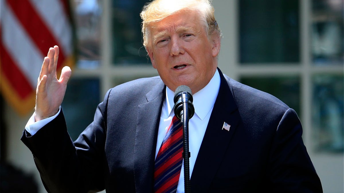 In this May 16, 2019, file photo, President Donald Trump speaks in the Rose Garden of the White House in Washington. A judge is poised to hear oral arguments Wednesday, May 22, 2019, over Trump's effort to block congressional subpoenas seeking financial records from two banks. (AP Photo/Manuel Balce Ceneta, File)