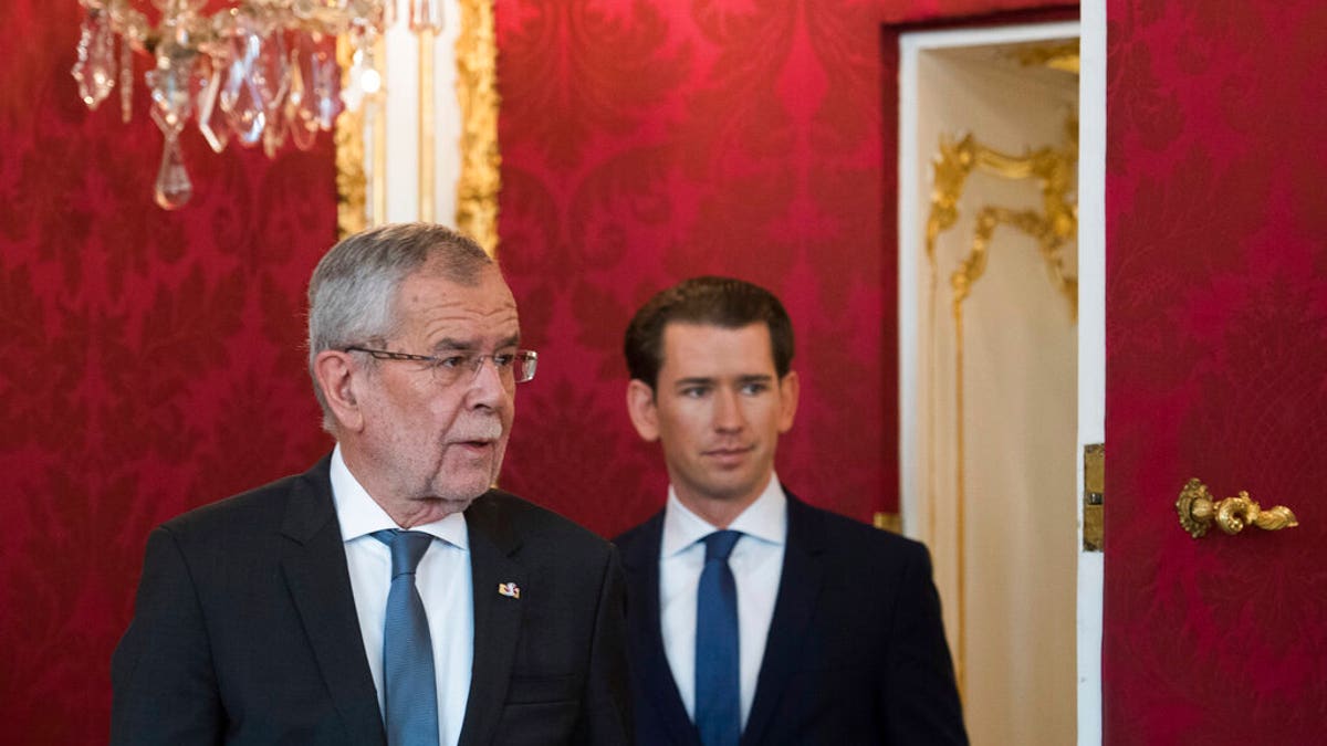 Austrian President Alexander Van der Bellen, right, and Austrian Chancellor Sebastian Kurz, left attending an inauguration ceremony at Hofburg palace in Vienna, Austria, Wednesday, May 22, 2019. Austrian Chancellor Sebastian Kurz has called for an early election after the resignation of his vice chancellor Heinz-Christian Strache from the Freedom Party spelled an end to his governing coalition.