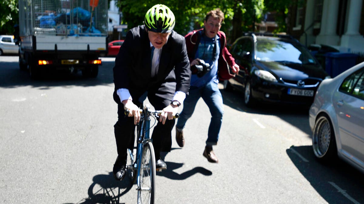 Politician Boris Johnson leaves his home, on the day of the European Parliament elections, in London, Thursday May 23, 2019.