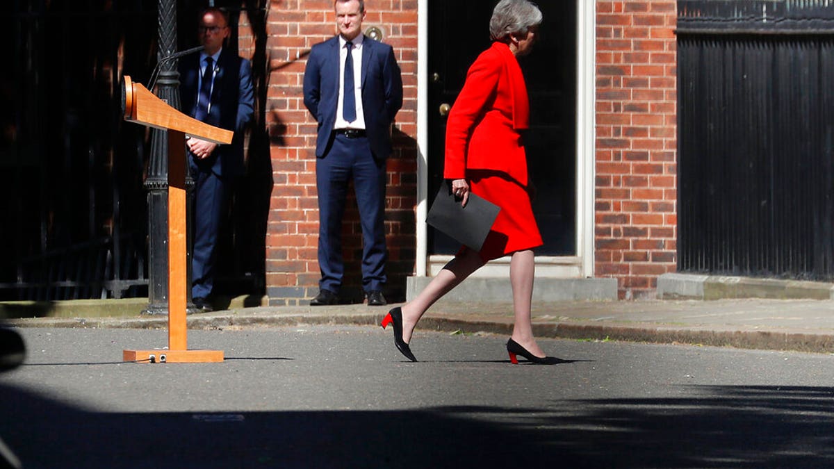 Britain's Prime Minister Theresa May walks back after addressing the media in Downing Street in London, Friday, May 24. May has announced that will step down as U.K. Conservative Party leader on June 7, sparking a contest to become Britain's next prime minister.