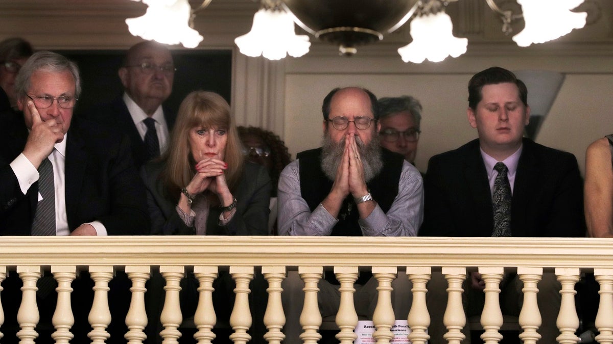 Spectators watch the debate over repealing capital punishment at the state Capitol in Concord, N.H. (AP Photo/Charles Krupa)