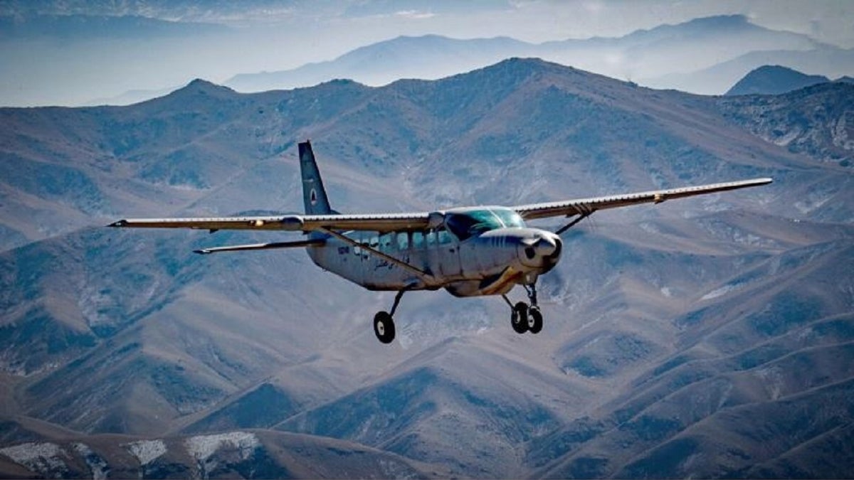 An Afghan pilot conducts training in a C-208 Caravan over Kabul, Afghanistan as part of the Train Advise and Assist Command's mission on Dec. 18, 2018. 