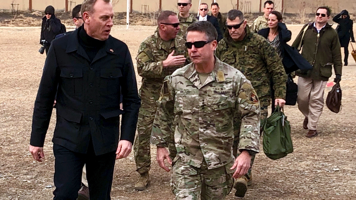 In this Feb. 11, 2019, file photo, acting Defense Secretary Pat Shanahan, left, arrives in Kabul, Afghanistan, to consult with Army Gen. Scott Miller, right, commander of U.S. and coalition forces, and senior Afghan government leaders. Amid a bloody stalemate in Afghanistan, the U.S. military has stopped releasing information often cited to measure progress in America’s longest war. 