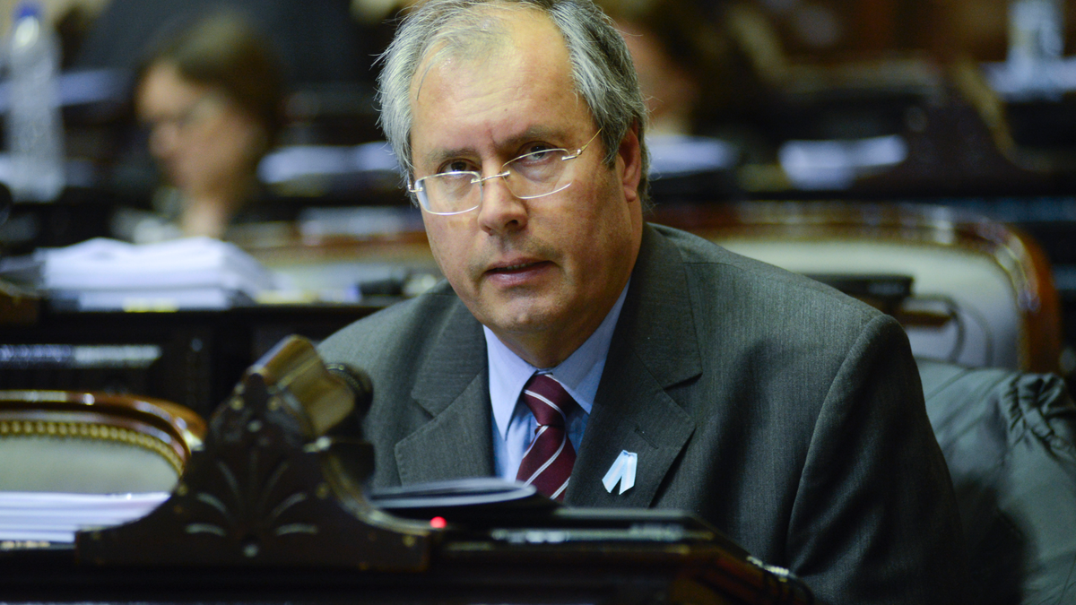 FILE - In this May 18, 2016 file photo provided by the Nation's Honorable Chamber of Deputies, lawmaker Hector Olivares attends a congressional commission session in Buenos Aires, Argentina. Argentine Senate President Federico Pinedo confirmed on May 12, 2019 that Olivares died after he was seriously injured in a May 9 shooting near the congressional building in Buenos Aires. (Nation's Honorable Chamber of Deputies, HCDN via AP, File)