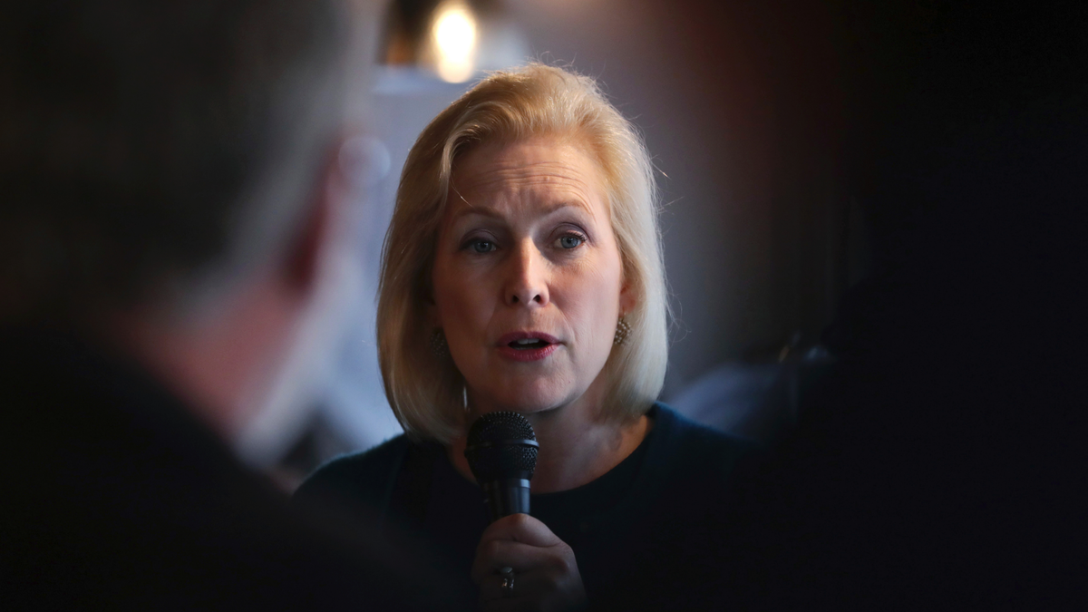In this May 10, 2019, file photo, Democratic presidential candidate Sen. Kirsten Gillibrand, D-N.Y., talks with guests during a campaign stop at a coffee shop in Derry, N.H. (AP Photo/Charles Krupa, File)