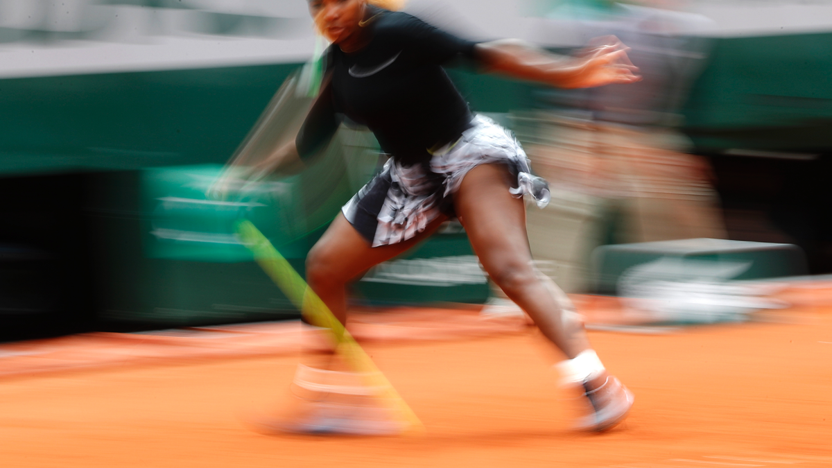 Serena Williams of the U.S. plays a shot against Japan's Kurumi Nara during their second round match of the French Open tennis tournament at the Roland Garros stadium in Paris, Thursday, May 30, 2019. (AP Photo/Pavel Golovkin)