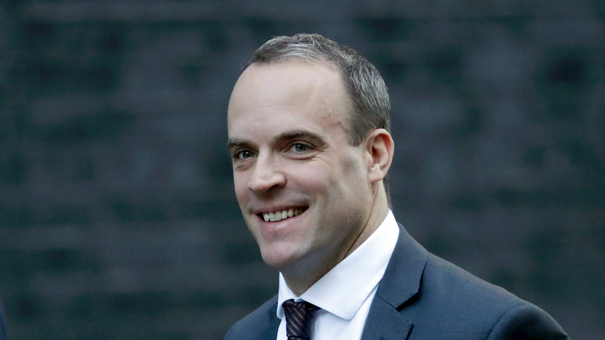 FILE - In this Tuesday, Nov. 13, 2018 file photo, Britain's Secretary of State for Exiting the European Union Dominic Raab arrives for a cabinet meeting at 10 Downing Street in London. Prime Minister Theresa May’s announcement that she will leave 10 Downing Street has set off a fierce competition to succeed her as Conservative Party leader and as the next prime minister.