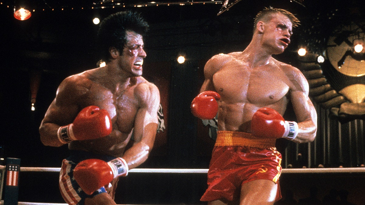 Sylvester Stallone punches Dolph Lundgren in a scene from the film 'Rocky IV', 1985. (Photo by United Artists/Getty Images)