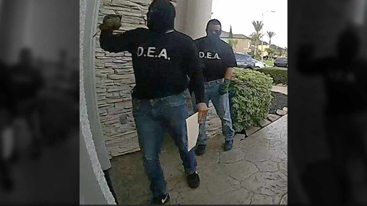 Pearland police are looking for two suspects who allegedly posed as DEA agents to get inside a house. 