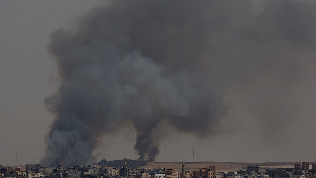Smoke rises from fires on Israeli farmland caused by arson balloons launched from Gaza City, Wednesday, May 15, 2019.