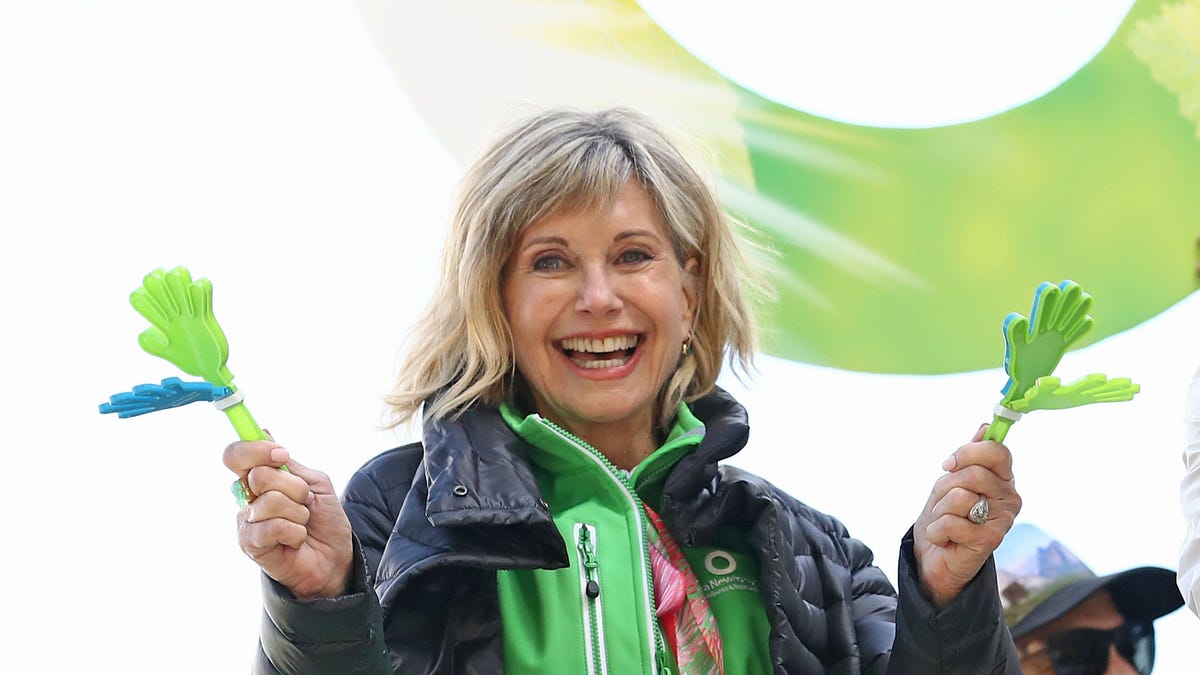 Olivia Newton-John encourages walkers during the annual Wellness Walk and Research Runon on Sept. 16, 2018, in Melbourne, Australia. 