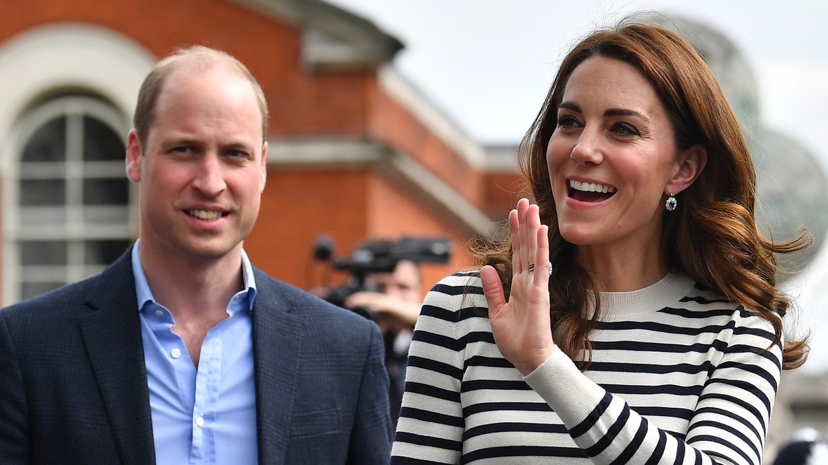 Kate Middleton and Prince William wave to well-wishers as they leave after attending the launch of the King's Cup Regatta at Cutty Sark, Greenwich on May 7, 2019 in London, England.