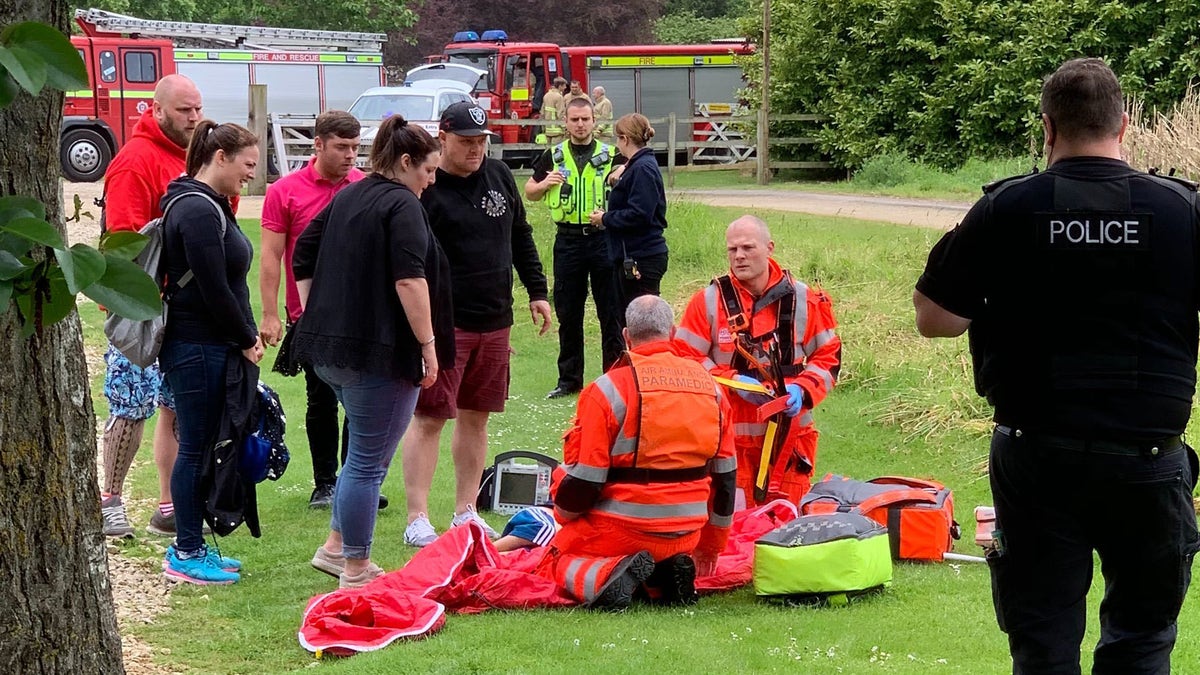 Paramedics attend to the boy who fell from a roller coaster at Lightwater Valley. (Photo by Simon Moran/Getty Images)