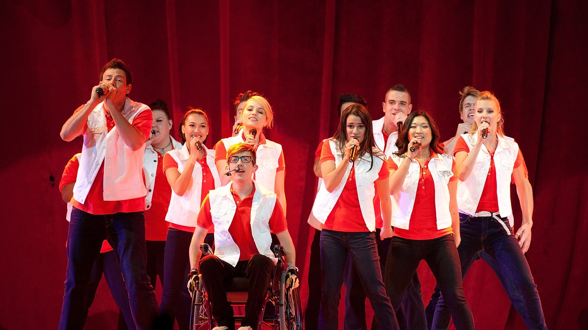 The cast of Glee performs onstage during the 2011 "GLEE Live" Concert Tour