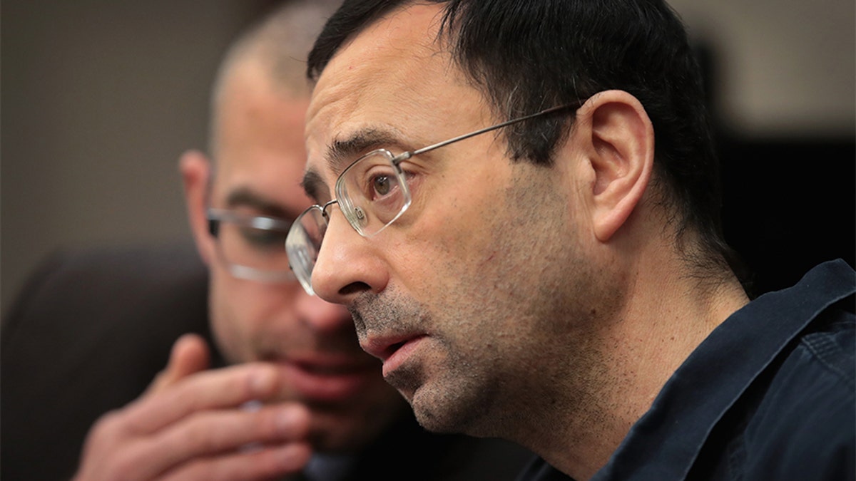 Larry Nassar appears in court to listen to victim impact statements during his sentencing hearing on January 17, 2018, in Lansing, Michigan. He was accused of molesting more than 100 girls while he was a physician for USA Gymnastics and Michigan State University. 