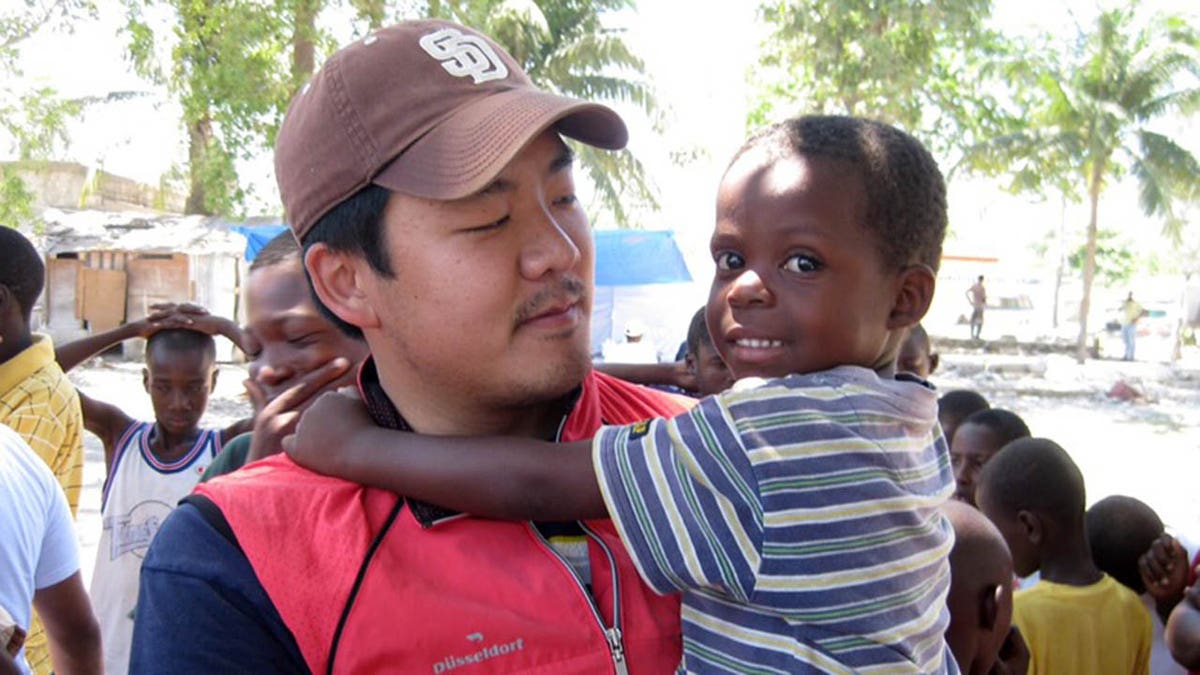 Human rights activist Adrian Hong, seen here in Haiti, was accused in the embassy break-in.