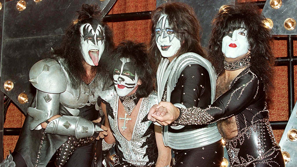 Band members Gene Simmons, Peter Criss, Ace Frehley and Paul Stanley during a news conference at Mann's Chinese Theatre in Hollywood promoting their album "Psycho Circus."