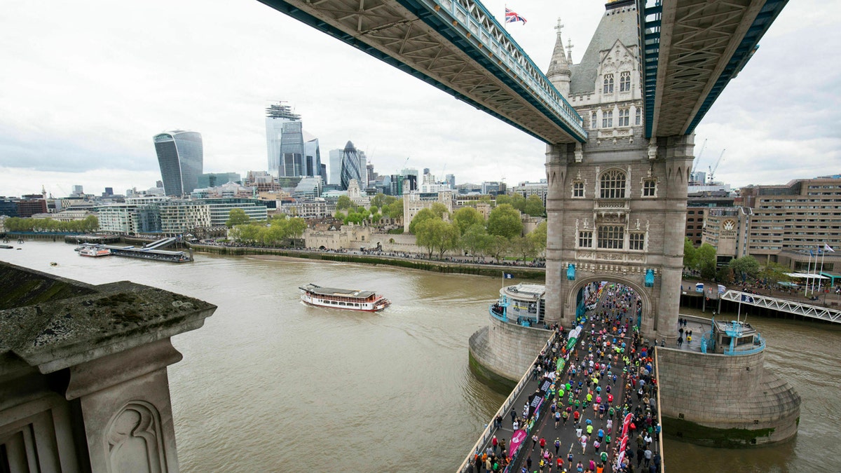 A British nurse who ran the London Marathon in her uniform said she was denied a Guinness World Records listing because she wasn't wearing a skirt, only scrubs.