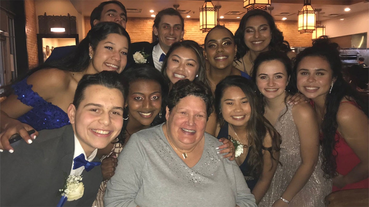 An older woman paid for the dinner of a group of kids from Clarksburg High School on prom night. (Therese de Leonn)