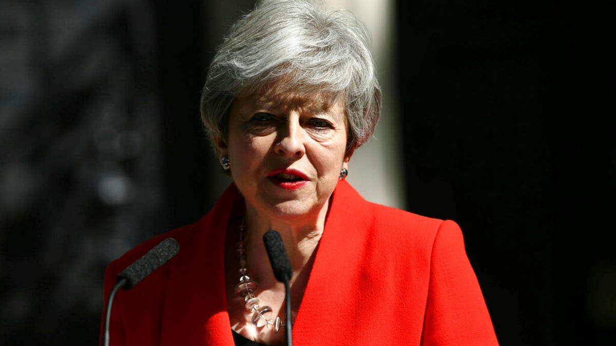 Britain's Prime Minister Theresa May makes a statement outside at 10 Downing Street in London, Friday May 24, 2019. Theresa May says she'll quit as UK Conservative leader on June 7, sparking contest for Britain's next prime minister. (Yui Mok/PA via AP)