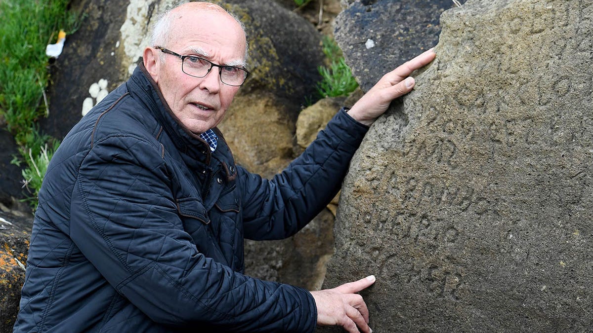 The inscriptions composed of indecipherable words on a rock in the Brittany village of Plougastel-Daoulas. The city launched a national call with a 2,000 euros reward to anyone able to solve the mystery of those inscriptions probably made during the 18th century.