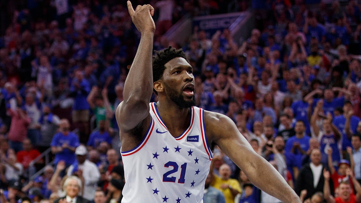 Philadelphia 76ers' Joel Embiid reacts to his dunk during the second half of Game 3 of the team's second-round NBA basketball playoff series against the Toronto Raptors, Thursday, May 2, 2019, in Philadelphia. The 76ers won 116-95. (AP Photo/Chris Szagola)
