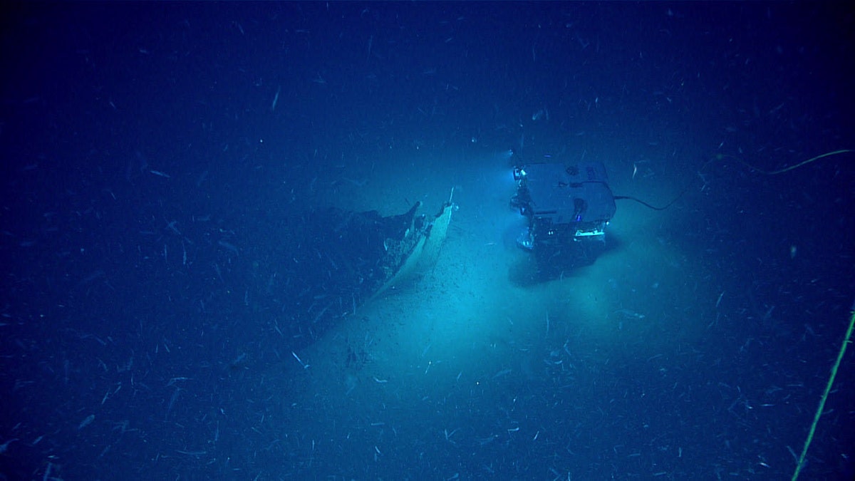 The Remotely Operated Vehicle (ROV) Deep Discoverer approaching the shipwreck's bow. (Image courtesy of the NOAA Office of Ocean Exploration and Research)