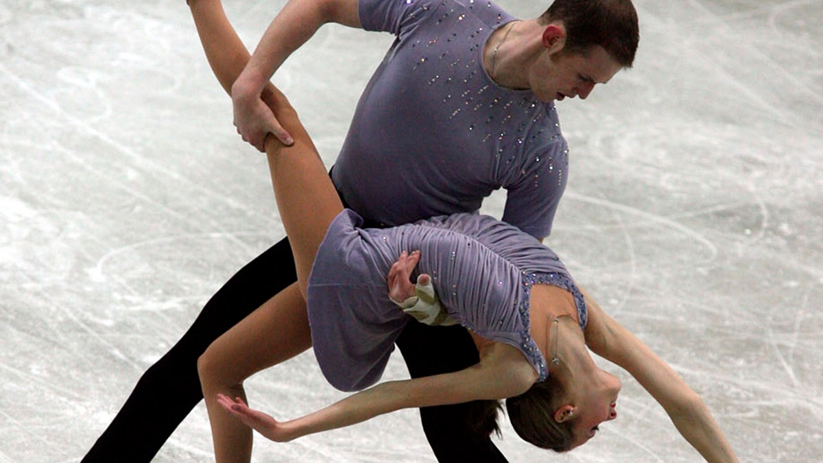 FILE - In this Dec. 8, 2006, file photo, Bridget Namiotka and John Coughlin perform during the ISU Junior Grand Prix of Figure Skating Final in Sofia, Bulgaria. (AP Photo/File)