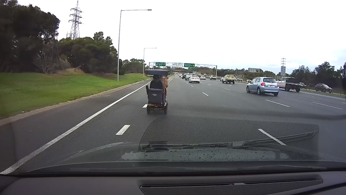 A 92-year-old man was seen on a dashcam video driving his mobility scooter onto a busy freeway in the suburbs of Melbourne, Australia on Friday.