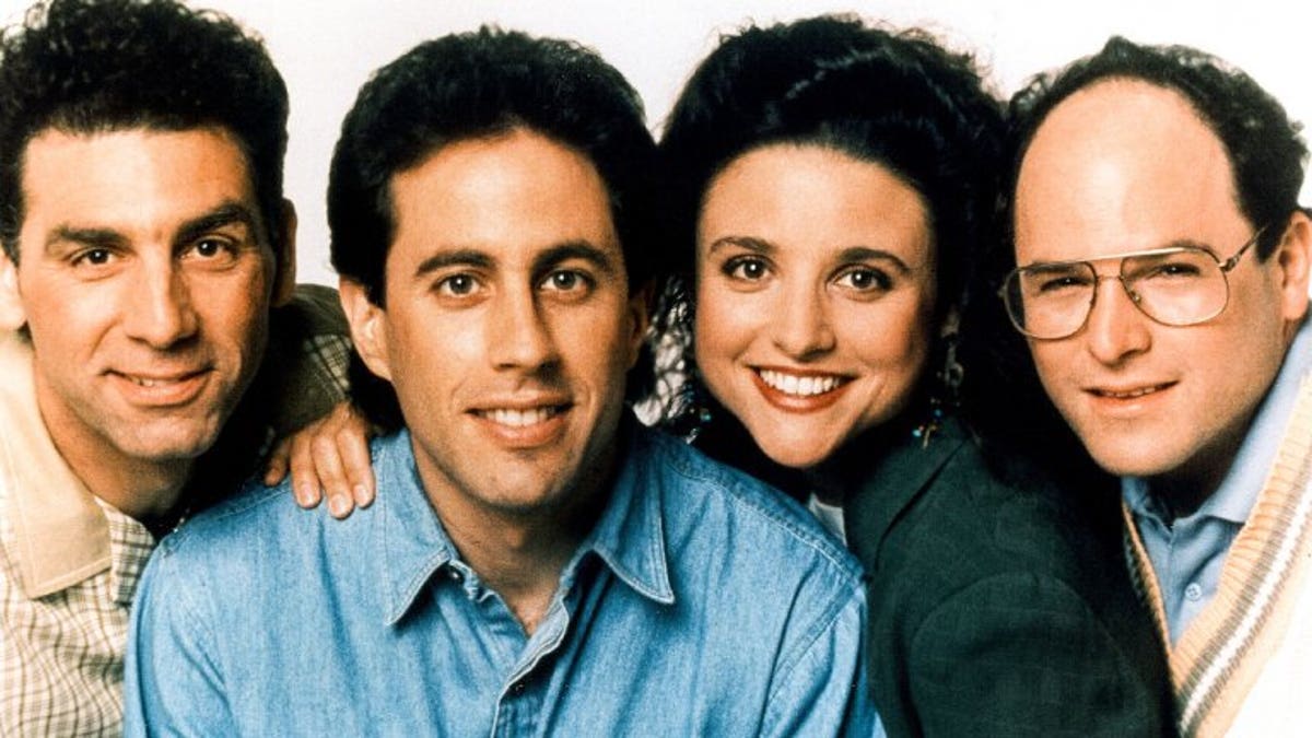 Michael Richards, Jerry Seinfeld, Julia Louis-Dreyfus and Jason Alexander pose for "Seinfeld" cast photo.