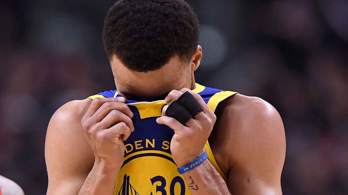 Golden State Warriors guard Stephen Curry (30) reacts during the second half of Game 1 of the team's basketball’s NBA Finals against the Toronto Raptors on Thursday, May 30, 2019, in Toronto. (Associated Press)