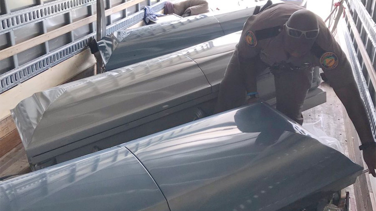 Multiple caskets turned up inside the truck.