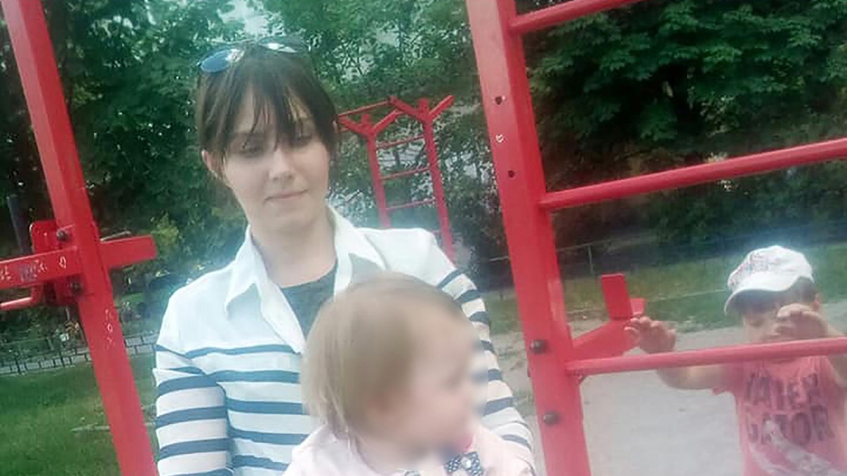 Viktoriya Devyatkina, 27, with her toddler daughter Alexandra, 24 months old.