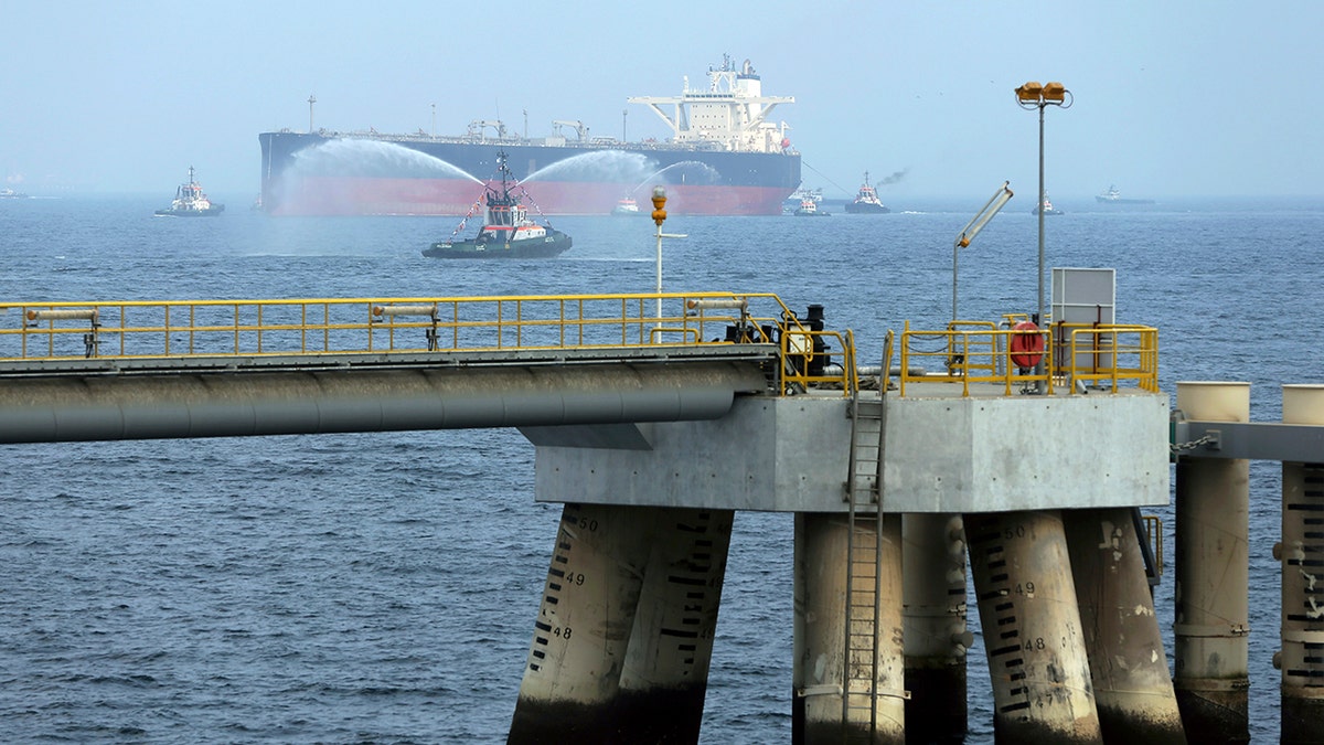 FILE - In this Sept. 21, 2016 file photo, an oil tanker approaches to the new Jetty during the launch of the new $650 million oil facility in Fujairah, United Arab Emirates. (AP Photo/Kamran Jebreili)