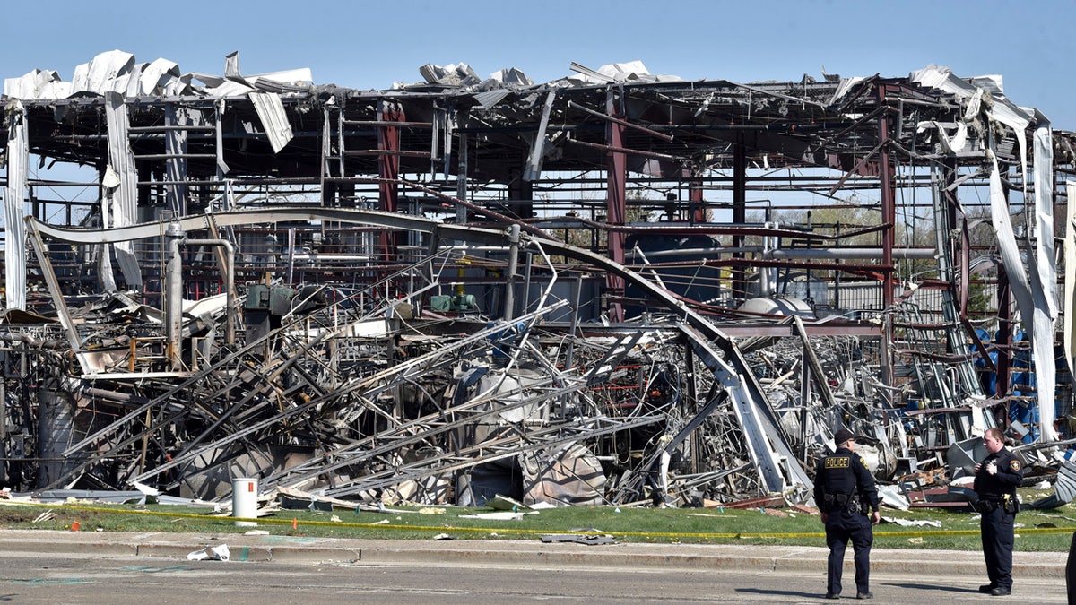 Emergency personnel work at the scene of an explosion at AB Specialty Silicones on Sunset Ave. and Northwestern Ave. on the border between Gurnee, Ill., and Waukegan on Saturday, May 4, 2019. The explosion happened Friday night. (John Starks/Daily Herald via AP)