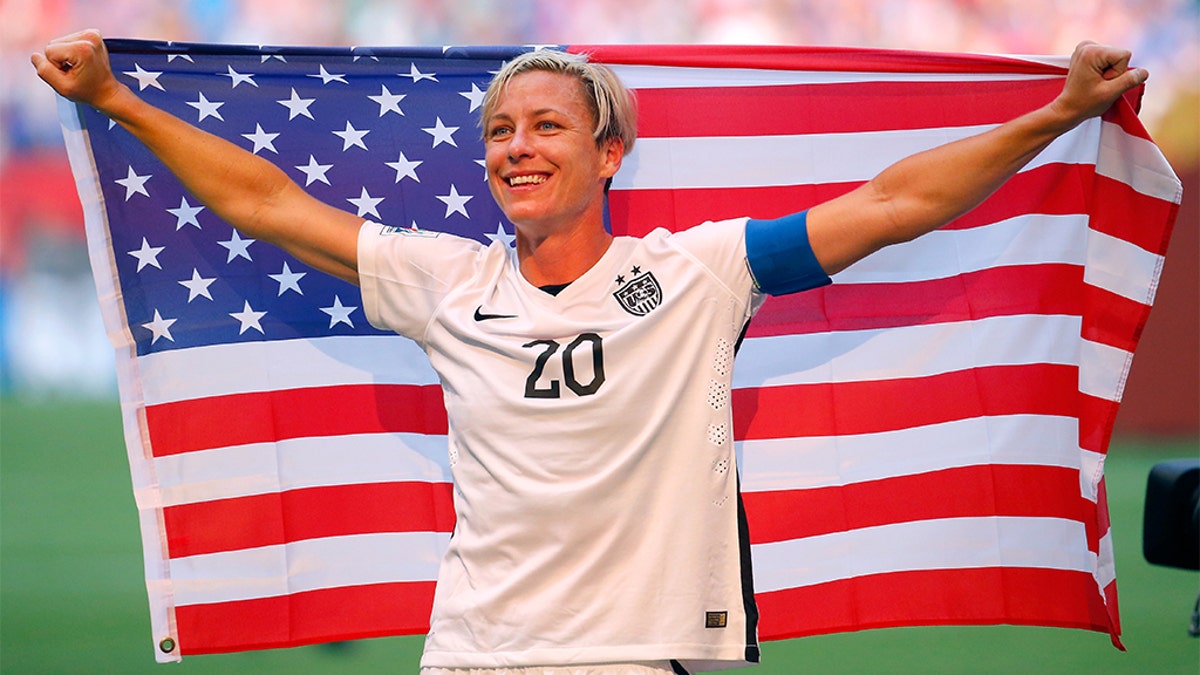 Abby Wambach celebrating the 5-2 victory against Japan in the FIFA Women's World Cup on July 5, 2015, in Vancouver, Canada. (Kevin C. Cox/Getty Images, File)